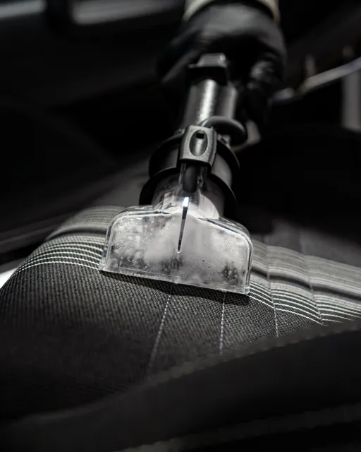 Shampoing d'un siège textile